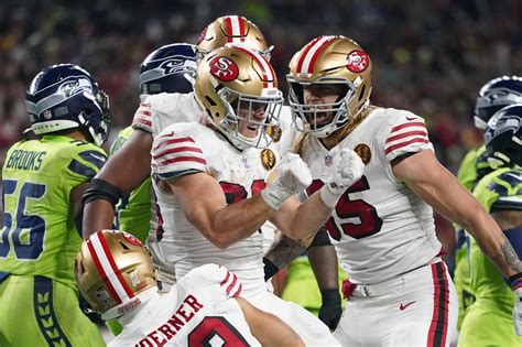 Christian McCaffrey’s big first half carries NFC West-leading 49ers to 31-13 victory over Seahawks